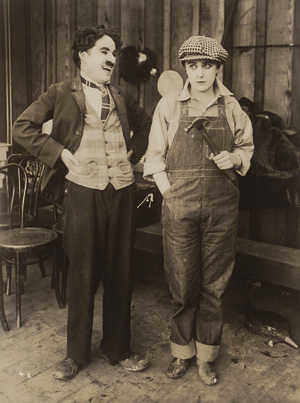 Lot 4148, Auction  118, Film Photography, Charlie Chaplin and Edna Purviance in "Behind the Screen"